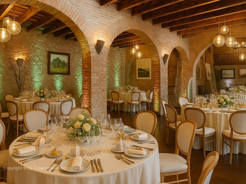 Indoor wedding setup in Catalan masia with vaulted ceilings and romantic lighting – Sitges countryside venue