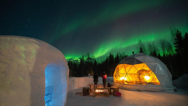 Northern Lights tour in Levi, Lapland, in Snow Igloo Park with Scandinavian Travel Group. Experience Polarman's Camp and Snow Igloo Park: An Enchanting Arctic Adventure

Welcome to Polarman's Camp and Snow Igloo Park, an exclusive haven just outside Levi, Finland (Lapland), where the magic of the Northern Lights and the charm of a Snow Igloo Park await you. Escape the tourist buzz and immerse yourself in a serene atmosphere with an unobstructed Northern horizon view, a panoramic 360⁰ sky view, minimal light pollution, and a cozy Aurora dome shelter!