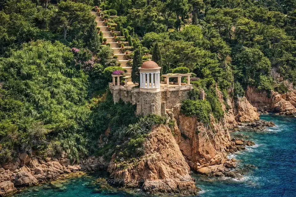 Aerial view of Jardines Marimurtra botanical garden clifftop ceremony venue, Blanes, Costa Brava Spain