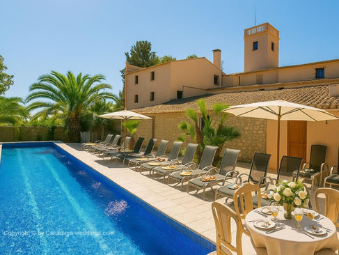 Charming Catalan masia near Sitges with stone courtyard and wedding tables – rustic destination wedding in Spain