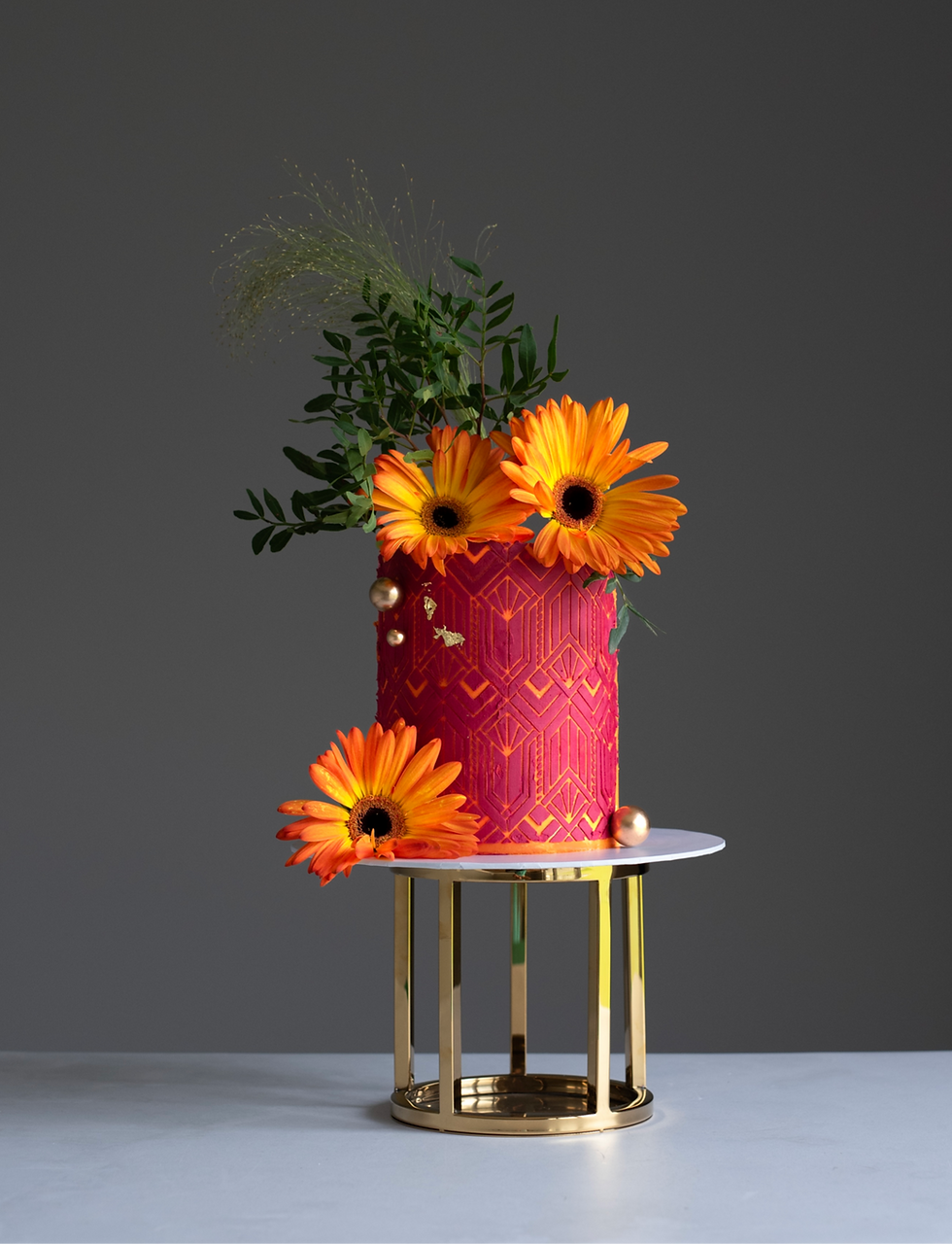 orange and burgundy flower cake