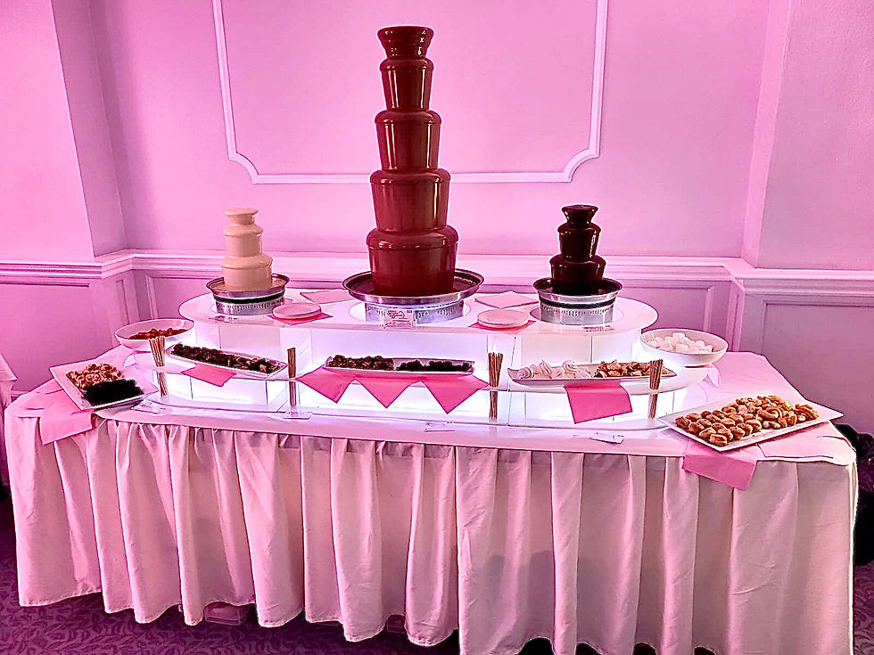 triple chocolate fountain hire with pink mood lighting hire