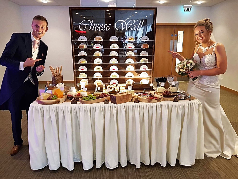 Bride & groom at the cheese table Cheese table wall hire rotherham