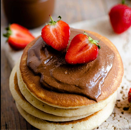 Pancakes strawberrys and nutella_edited.png