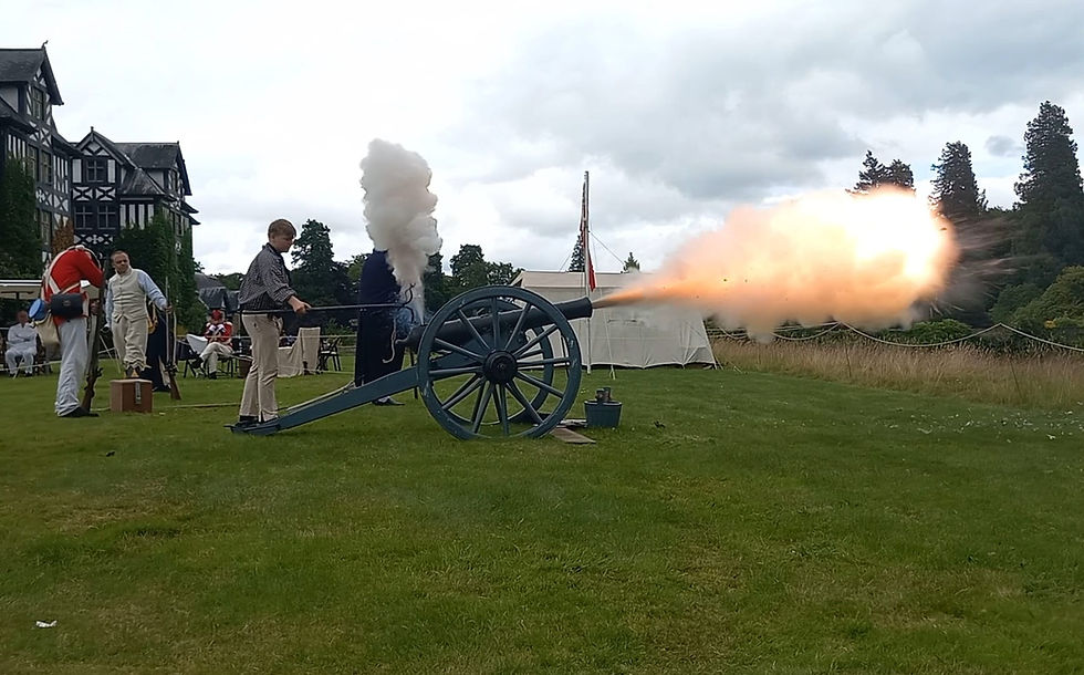 Eye-level view of a 6-pound cannon named 'Jumping Jenny' prepared for display