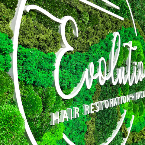 Close-up of the Moss Sign Wall for a beauty salon