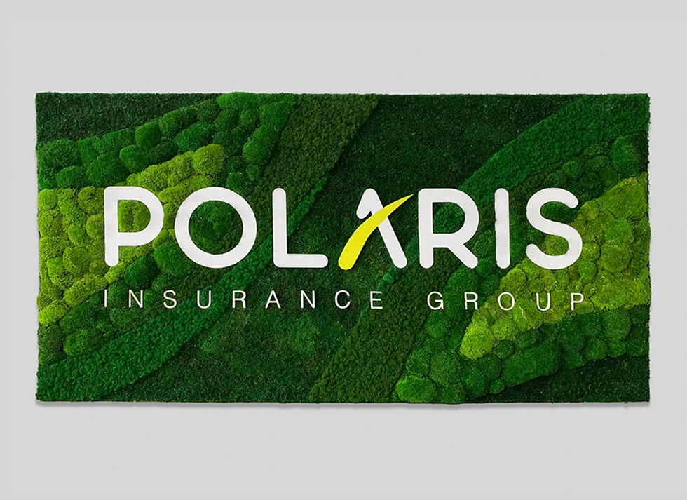 Polaris Insurance Group seamless moss wall installation showing real moss panels matching the digital rendering.