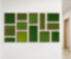 Retail corridor wall featuring modular acoustic moss panels in varied preserved green tones