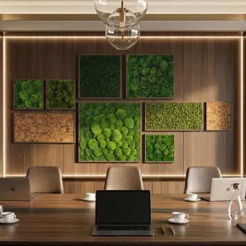 Acoustic moss wall panels arranged in a modern office meeting room, combining preserved moss textures for sound absorption and biophilic design
