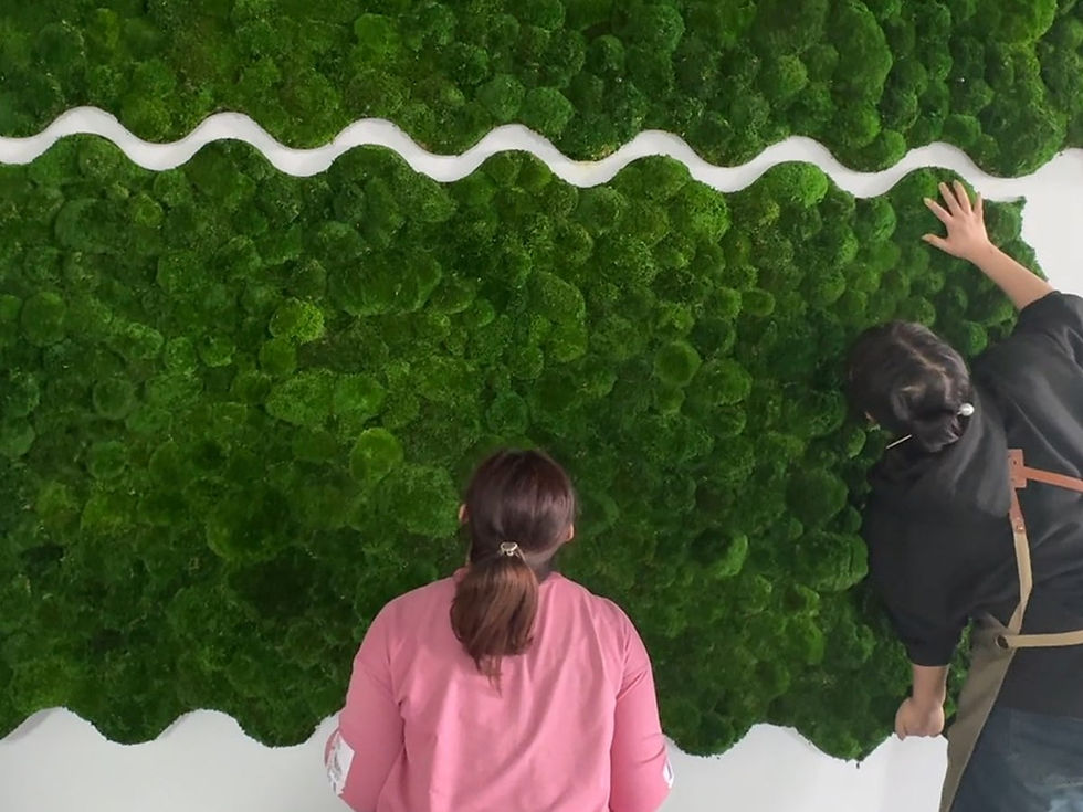 Step-by-step installation process of seamless bun moss wall panels, showing the easy application of moss tiles on the wall