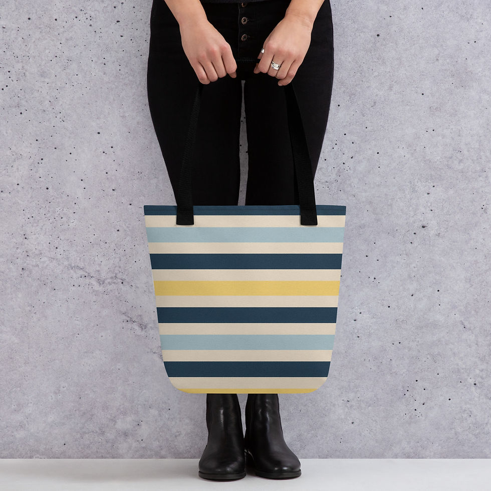 Modern nautical tote bag with oversized navy-and-white stripes, colorblocked in pastel baby blue and butter yellow.