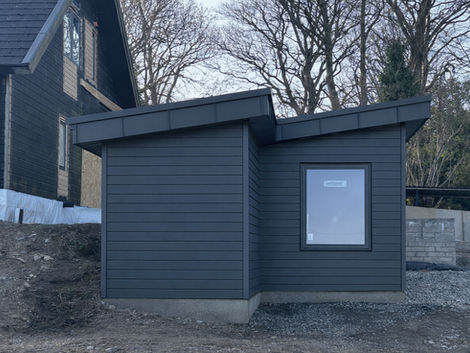 Graphite black aluminium fascia and soffit cladding on outbuilding in Killakee Dublin