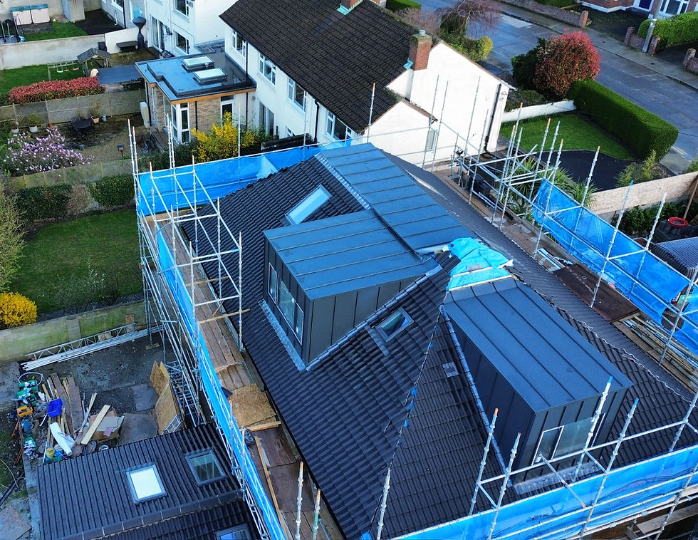Aluminium dormer extensions Booterstown Dublin with standing seam metal cladding on modern home