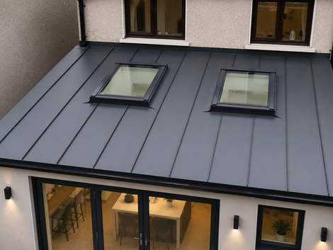 Close-up of Vestis Anthracite aluminium standing seam roofing with integrated rooflights on a kitchen extension in Clogherhead, Co. Louth.