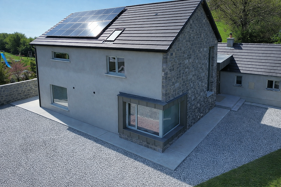 Zinc façade cladding Ardee Louth – Rheinzink Graphite bay window extension