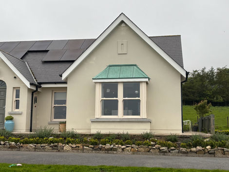 Vestis Copper Green aluminium bay window roof creating the appearance of naturally aged copper in Carlingford, County Louth.