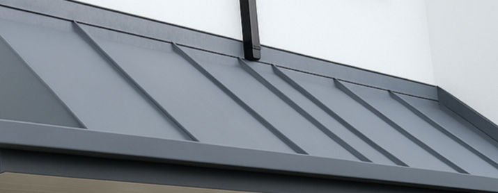 Detail of zinc standing seam door canopy in Balbriggan Dublin