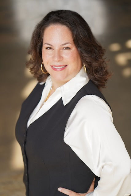 Portrait of Margarita, founder of The Magnolia Group