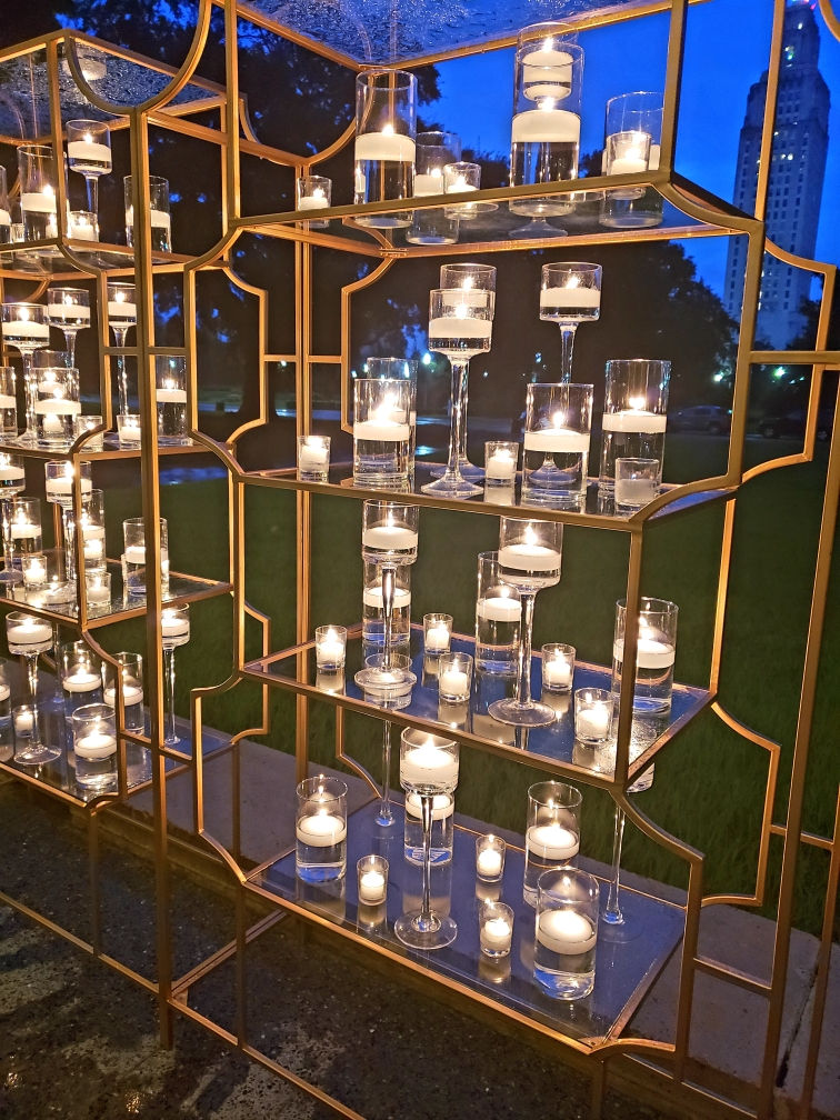 Clear stems & cylinders on gold shelf