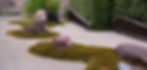  A captivating image of a Japanese Zen Garden showcasing serene sand patterns and thoughtfully placed rocks, embodying tranquility and balance.