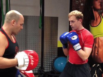 Alan holding pads for Sean