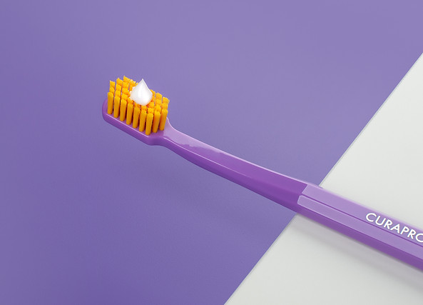 toothbrush_cs_5460_violet_with_toothpaste.jpg