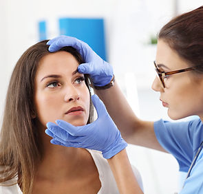 adult-woman-having-visit-female-doctor-s-office.jpg