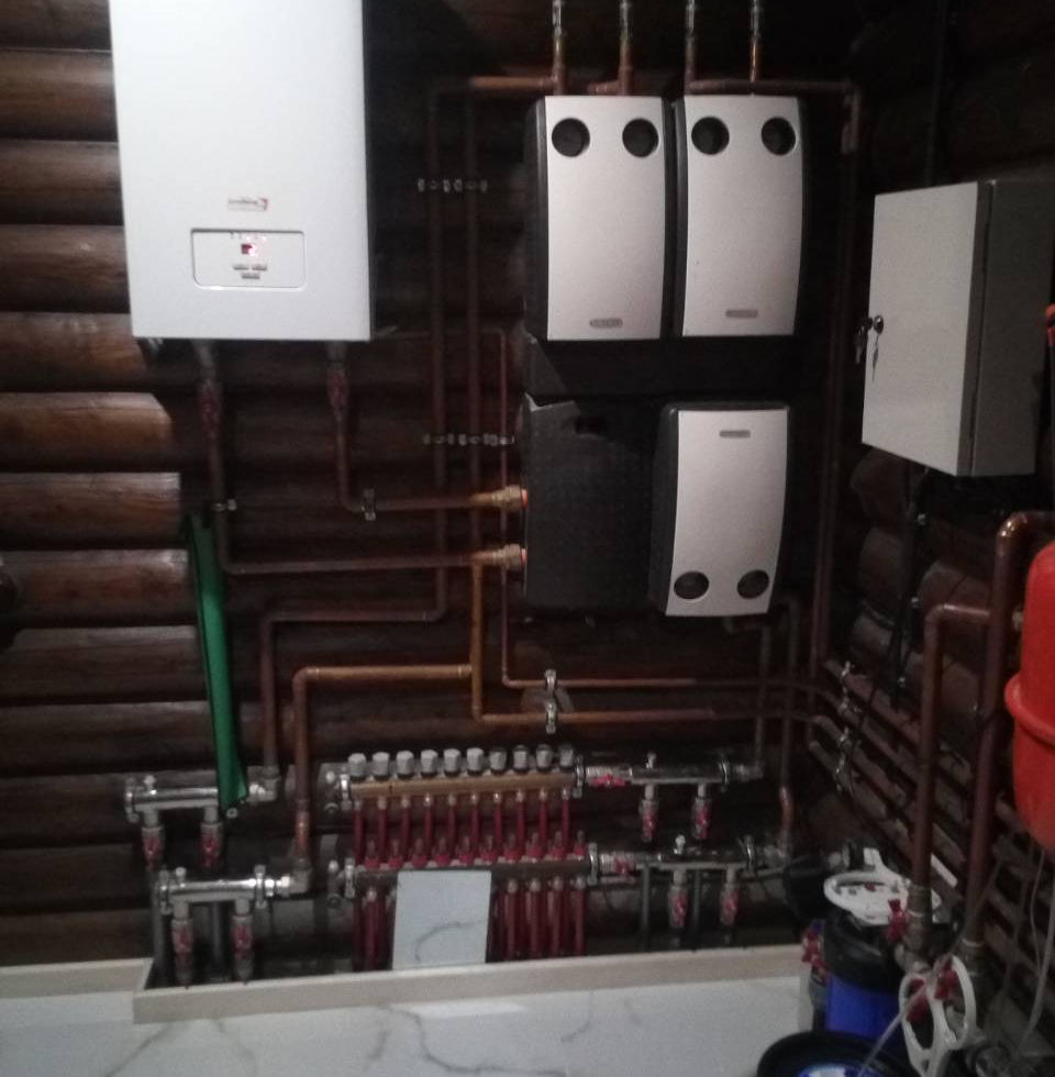 Boiler Room in a Log House with Protherm Electric Boiler, Copper Piping & Meibes Pump Groups