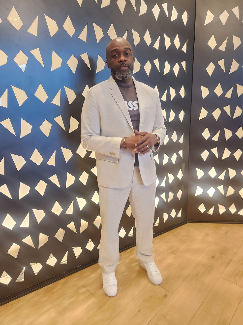 Author Jsin Graham in a linen suit