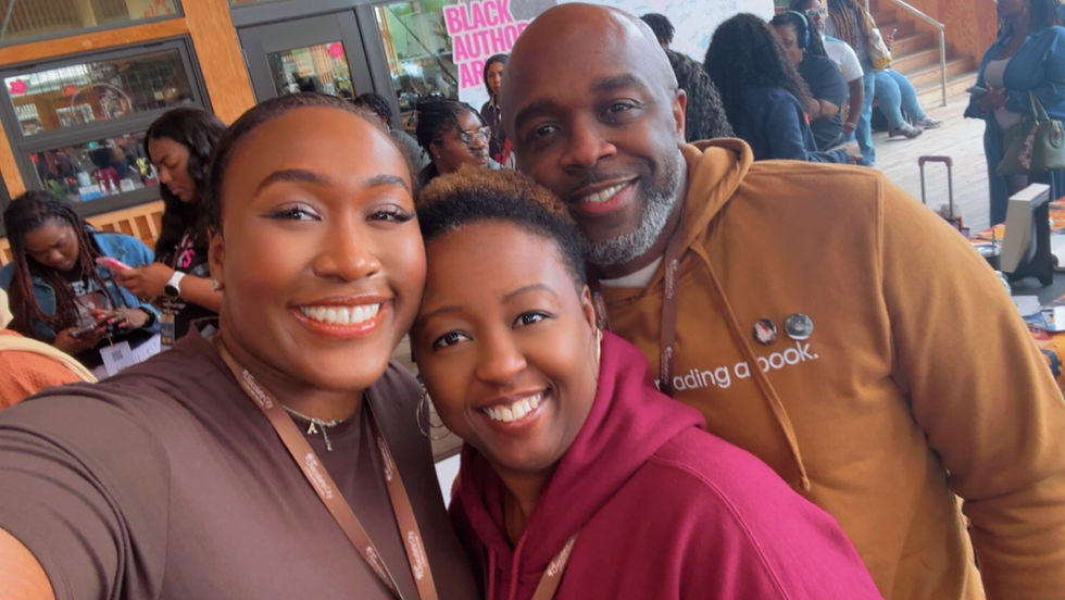Picture of Jsin Graham with the wife-ager, and PHIL, 2/3s of The Most