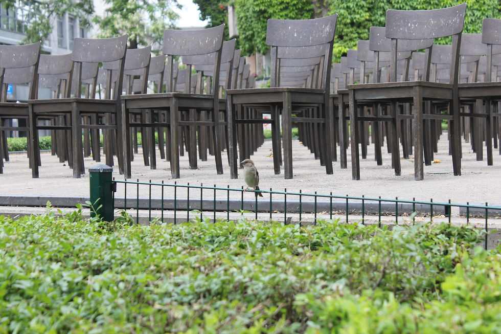 Emty bronze chairs - Monument