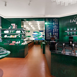 Serving an Ace: How Café Lacoste is Perfecting the "Brand Lifestyle" Playbook