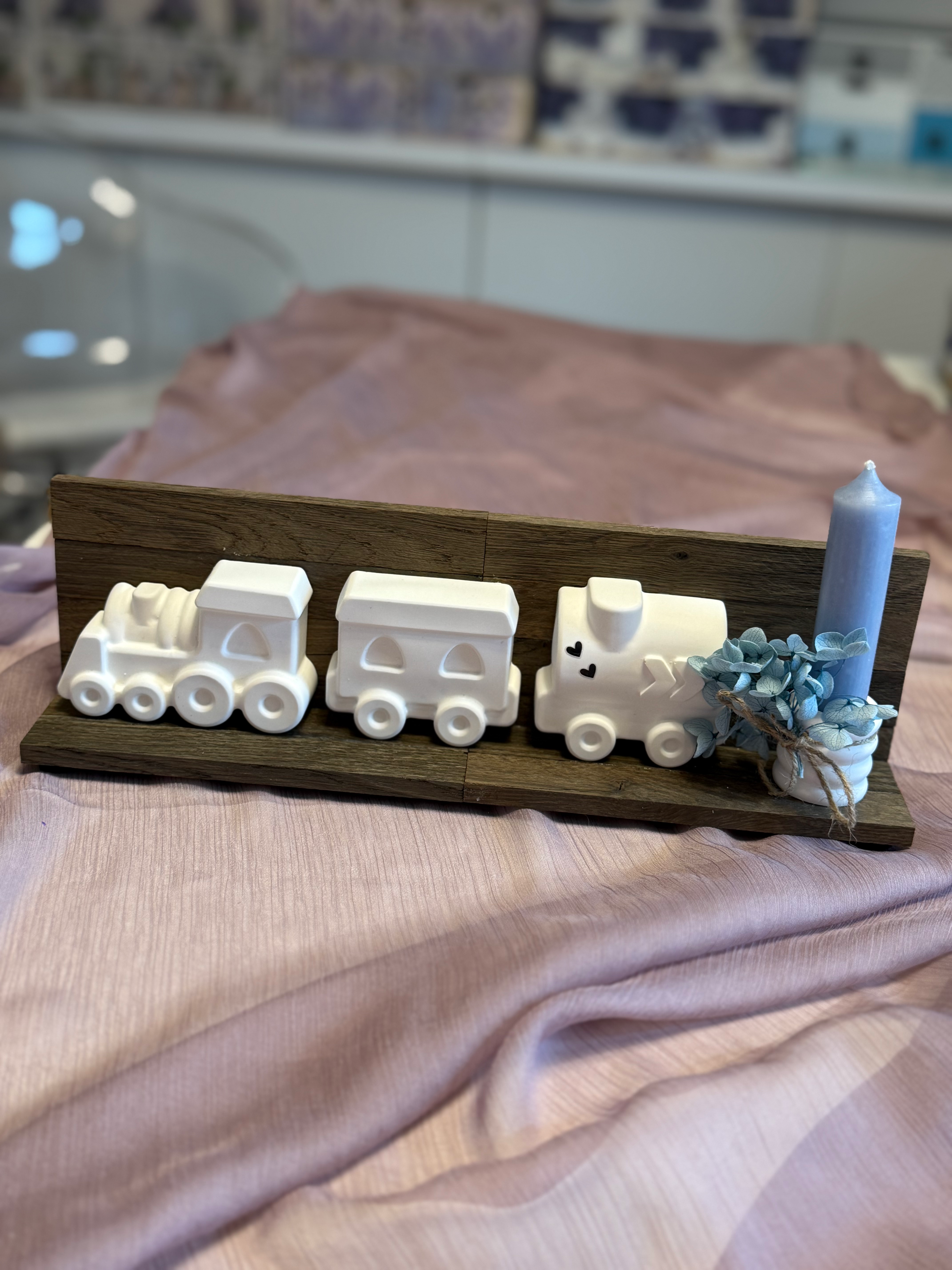 Kleine Lon mit blauer Kerze