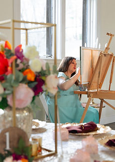 A live event painter working