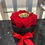 Thumbnail: Vibrant red roses in a black box with a red bow.