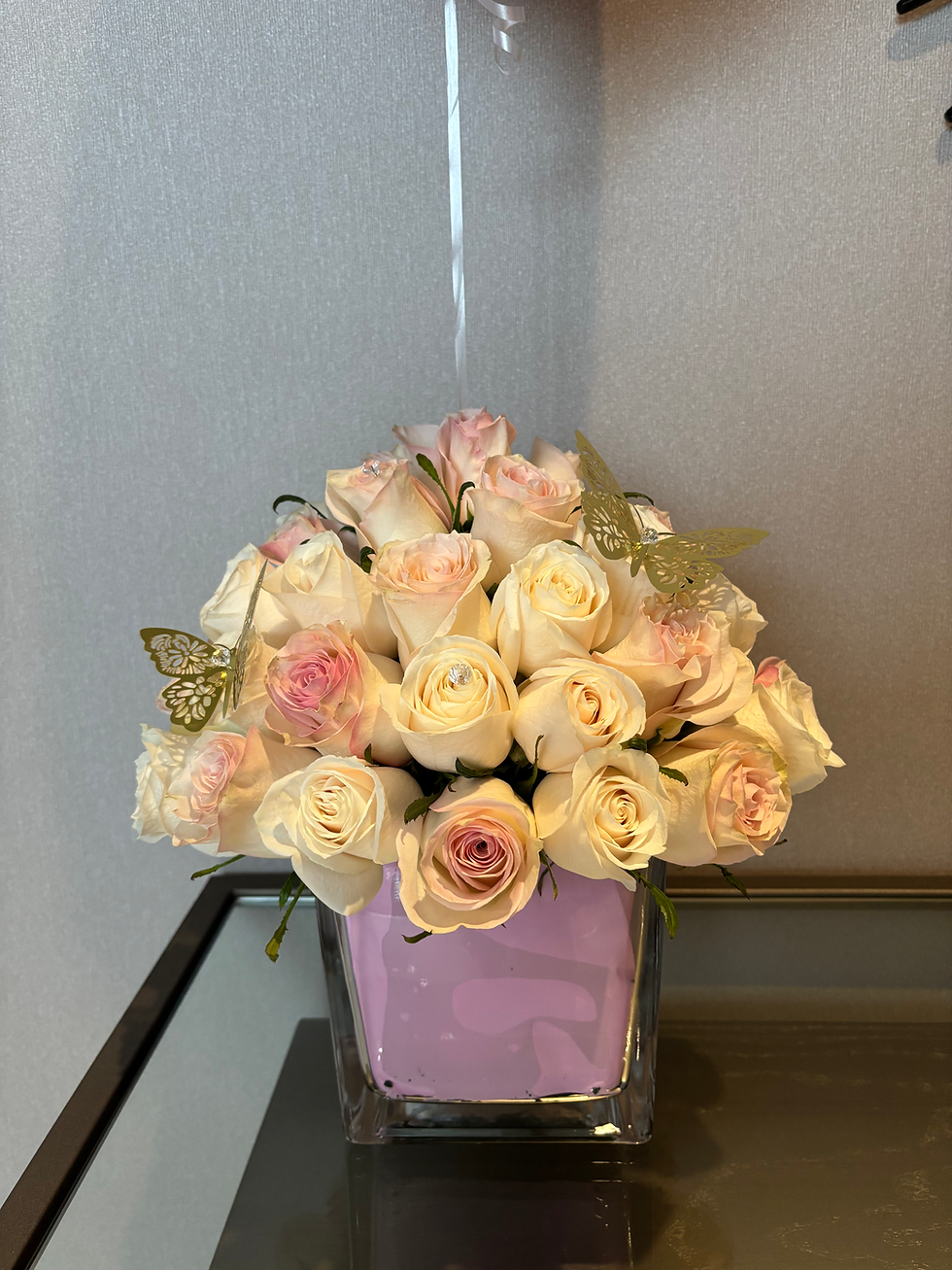 Thumbnail: Pink and cream roses in a square box with decorative butterflies; Doral Blooms