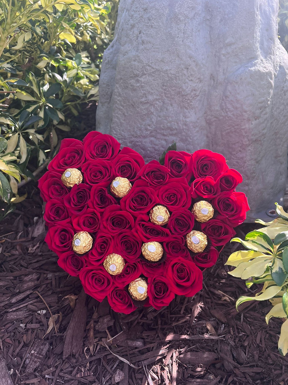 Heart-shaped bouquet of 100 red roses and chocolates, Doral Blooms.
