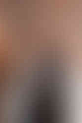 a group of women are posing for a picture and smiling