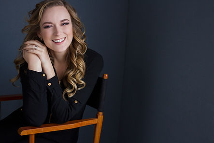 Tanaya Hachey smiling in a chair