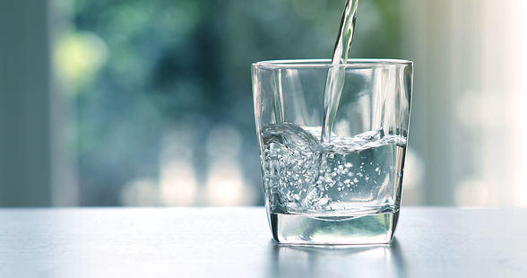 Water being poured into a glass