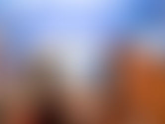 Someone taking a picture at a wedding via a cell phone