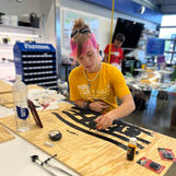 Smarts and Sparks' Malaina painting on wood