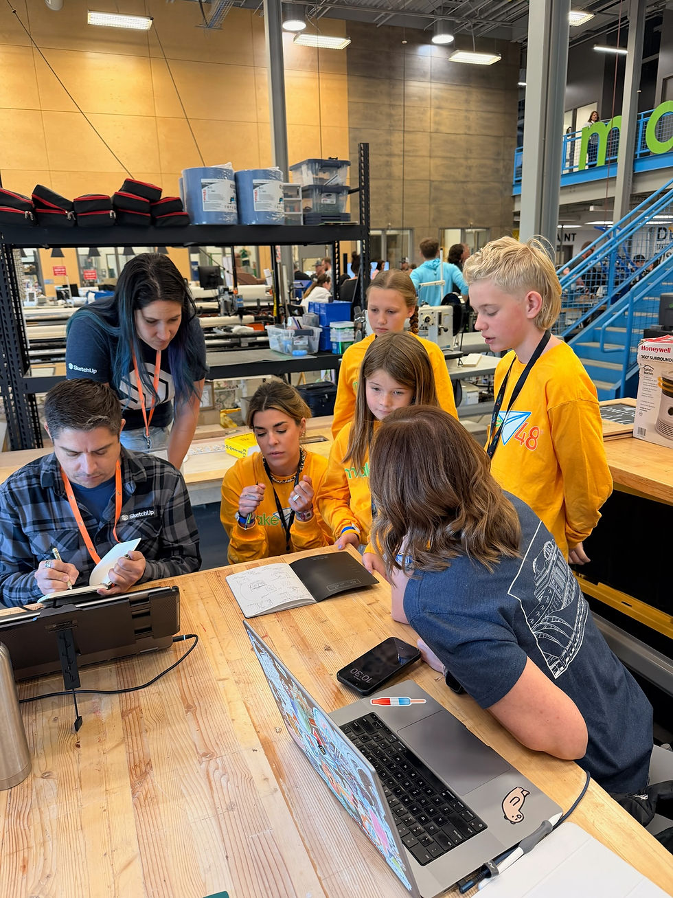 3 Trimble CAD experts with student team