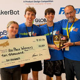 Architecting the Mastery holding the 1st place trophy and giant Make48 check for $10,000
