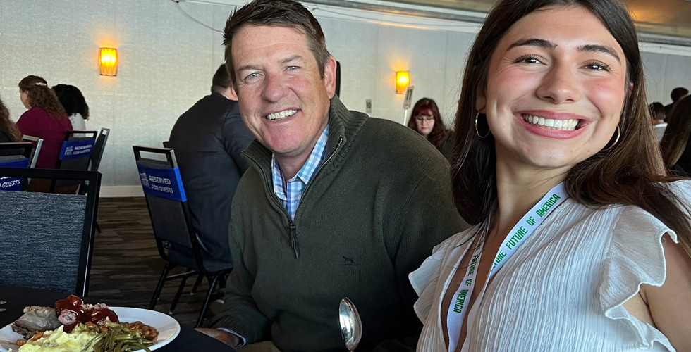 Tom Gray and student at dinner