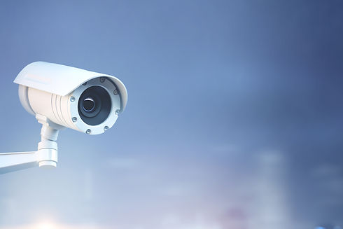 Modern CCTV camera on a wall.jpg