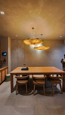 Oorja lights illuminating the micro-concrete in the space