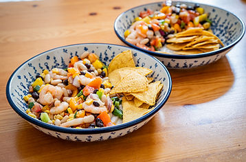 Cowboy caviar salad, beans, shrimp, pepper, tomato, avocado, tortilla chips