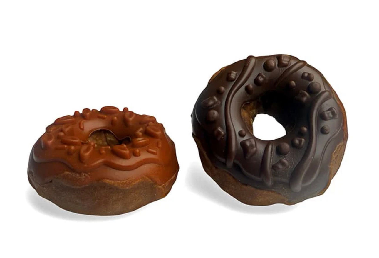 Two chocolate donut-shaped treats