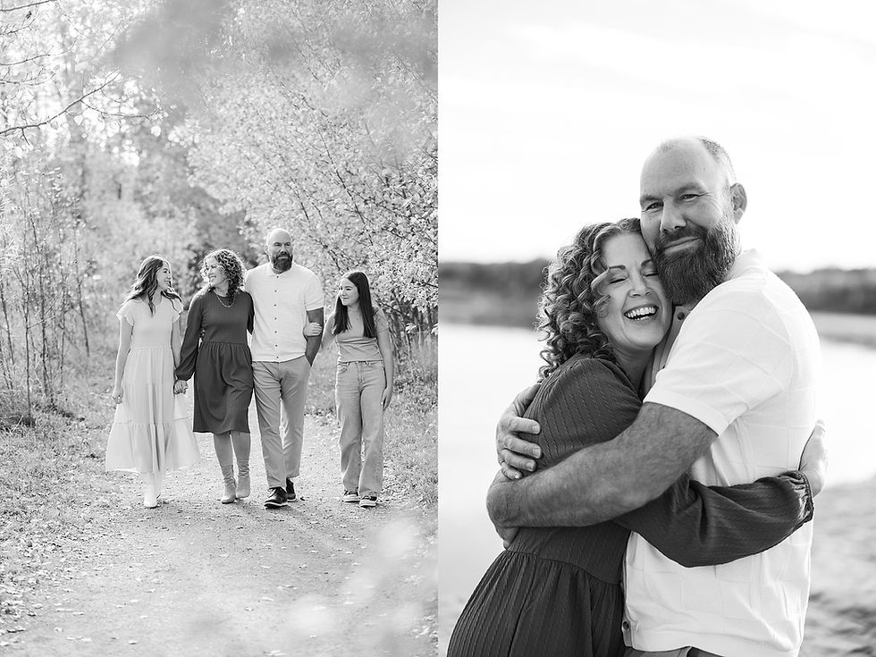 Family walking on a tree-lined path and hugging by a lake. Smiling and holding hands, evoking warmth and connection. Black and white.